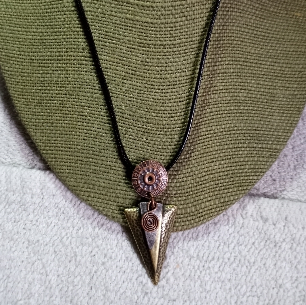 Coppertone goldtone silvertone triangle pendant black cord necklace